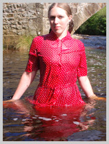 Purity goes for a paddle in a nice red dress featuring Purity, the artist Purity goes for a paddle in a nice red dress featuring Purity, the artist